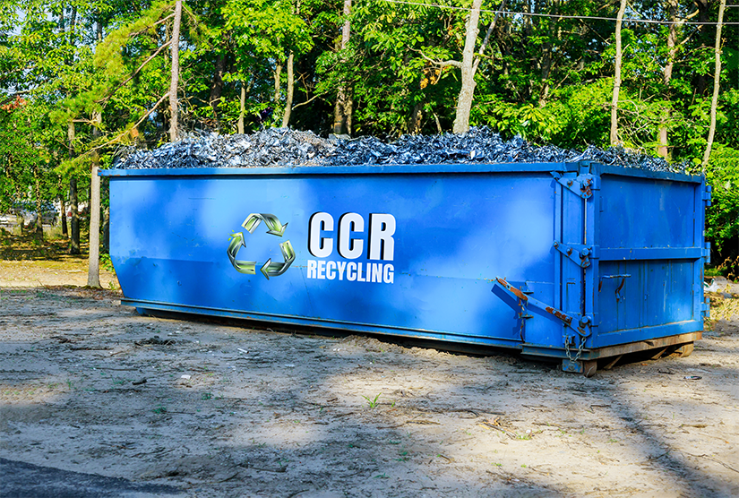 CCR Recycling blue bin holding scrap metal